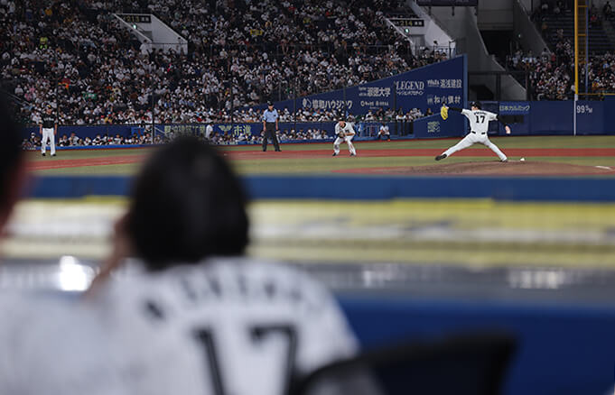 Baseball player watching the game